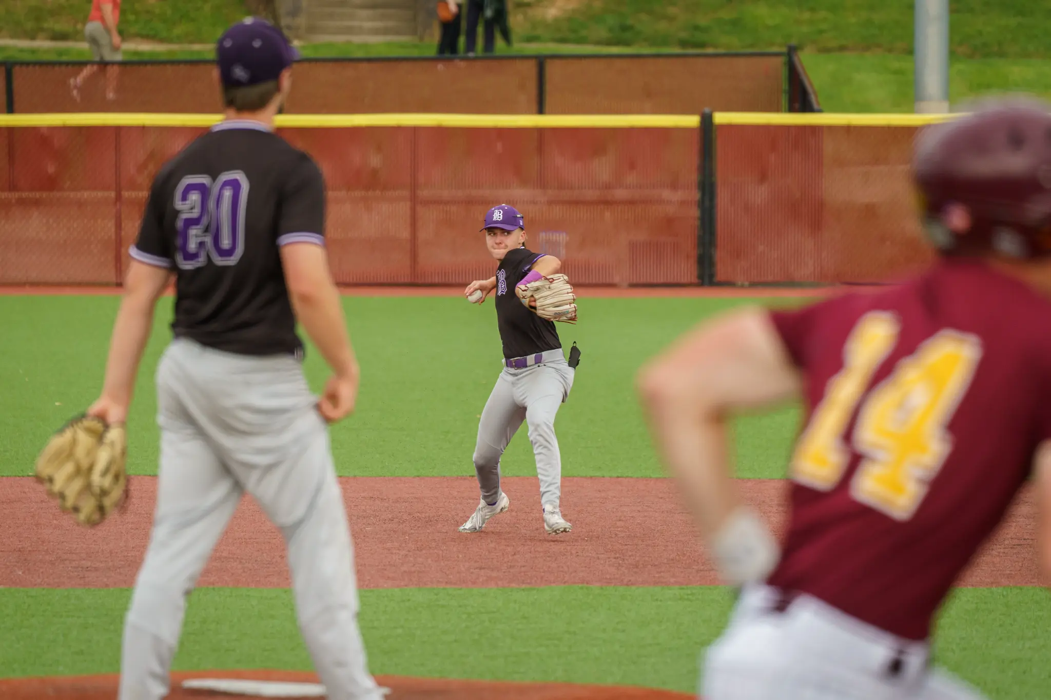 Reid Walker throwing across the infield